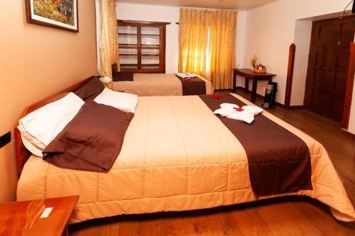 Foto de una habitación de Hotel Sol del Oriente Cusco