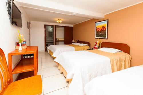 Foto de una habitación de Hotel Sol del Oriente Cusco