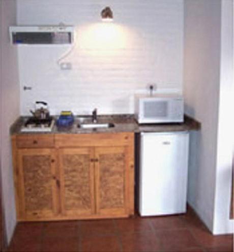 Foto de una habitación de Costa Serrana Apart Hotel