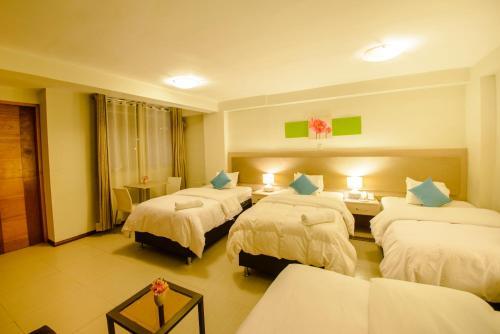 Foto de una habitación de Hotel Wayta Inn