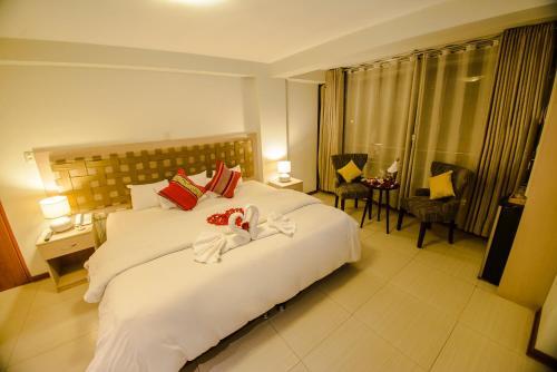 Foto de una habitación de Hotel Wayta Inn