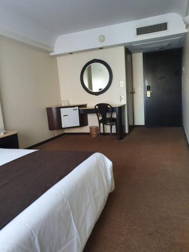 Foto de una habitación de Apartamentos Departamento Céntrico