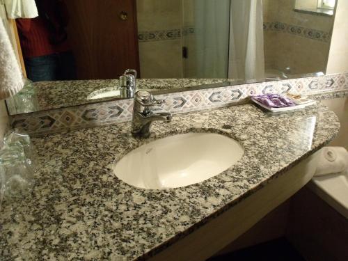 Foto de una habitación de Apartamentos Departamento Céntrico