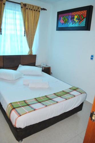 Foto de una habitación de Hotel Najjez