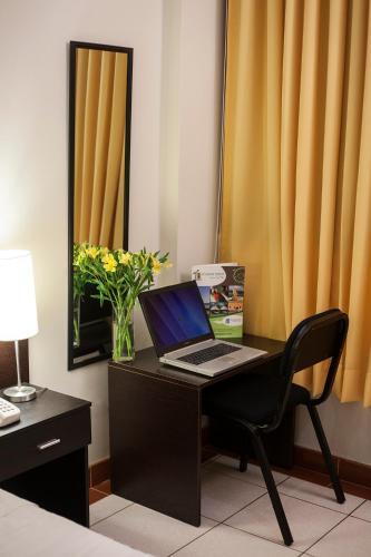Foto de una habitación de Hotel Fatima Inn