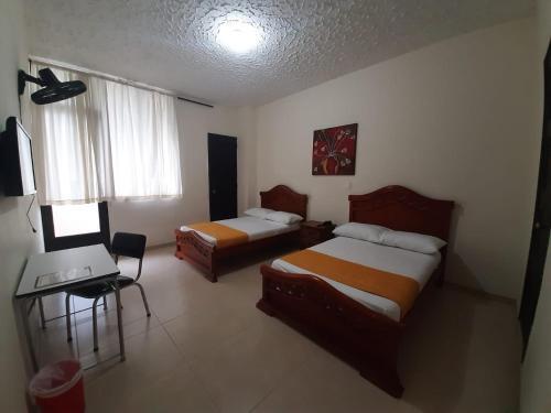 Foto de una habitación de Hotel Cataluña
