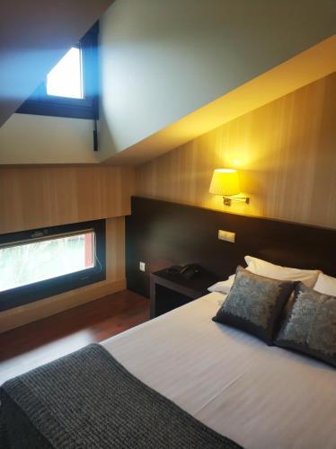 Foto de una habitación de Hotel Puerta del Arco