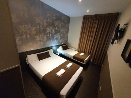 Foto de una habitación de CH Lemon Rooms - Madrid