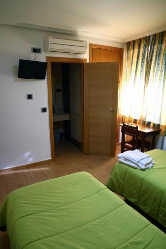 Foto de una habitación de Hostal Muralla