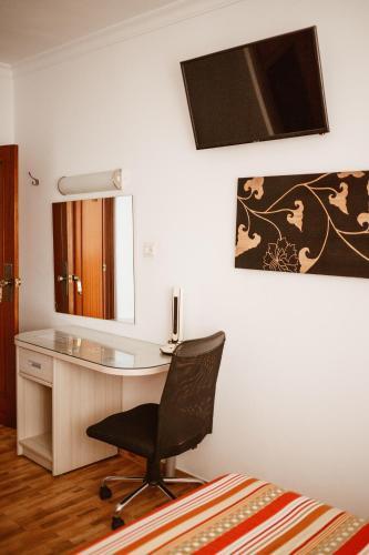 Foto de una habitación de Hostal la Campana