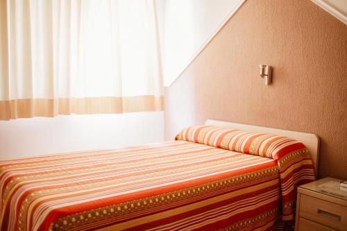 Foto de una habitación de Hostal la Campana