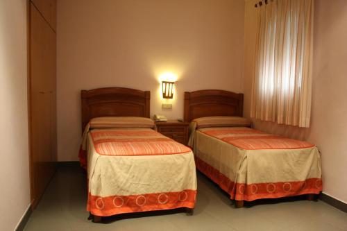 Foto de una habitación de Hostal La Nava