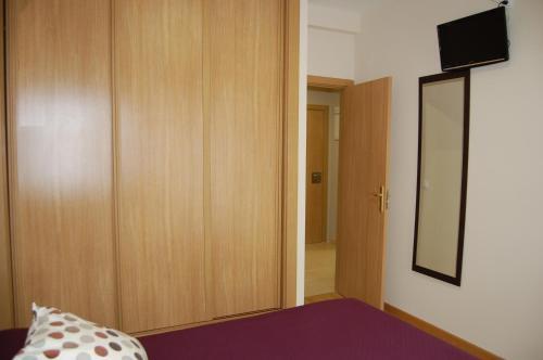 Foto de una habitación de Aparthotel Encasa