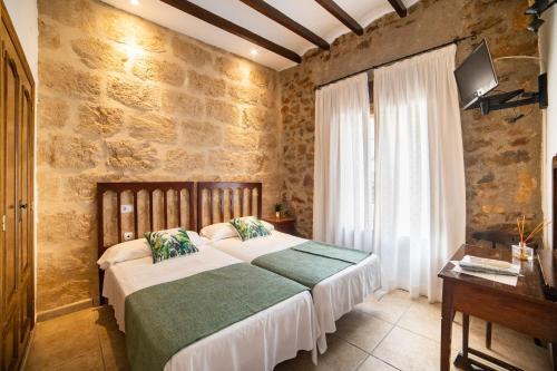 Foto de una habitación de Hostal Tres Molins
