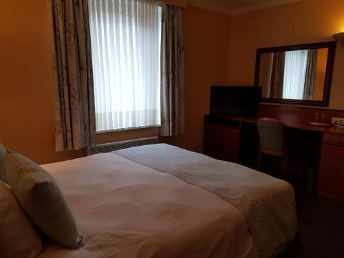 Foto de una habitación de Hotel Beach Palace