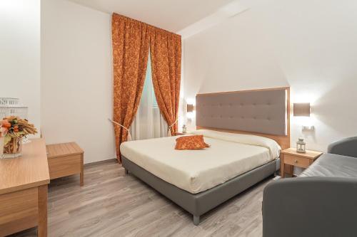 Foto de una habitación de Hotel Il Buongustaio