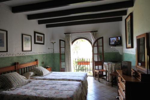 Foto de una habitación de Petit Hotel Ses Rotges