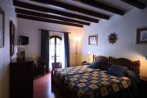 Foto de una habitación de Petit Hotel Ses Rotges