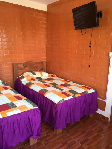 Foto de una habitación de Hotel El Molle