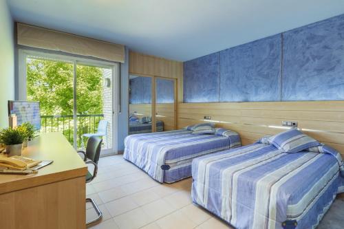 Foto de una habitación de Hotel Sausa