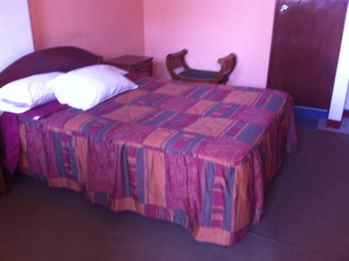 Foto de una habitación de Hostal Tres Máscaras