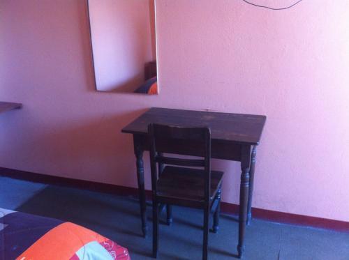 Foto de una habitación de Hostal Tres Máscaras
