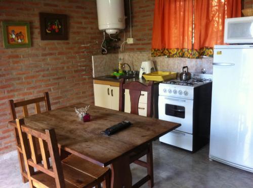 Foto de una habitación de Yerba Buena casas de campo - Arroyo de los Patos
