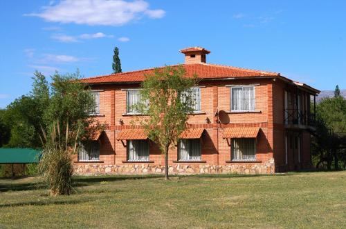 Foto de una habitación de Yerba Buena casas de campo - Arroyo de los Patos