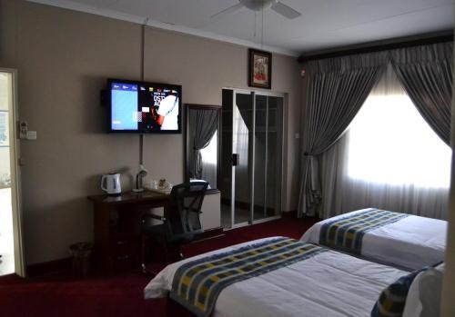 Foto de una habitación de Triple Palms Bed and Breakfast