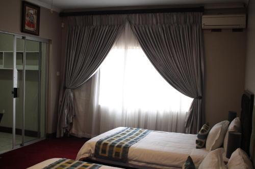 Foto de una habitación de Triple Palms Bed and Breakfast