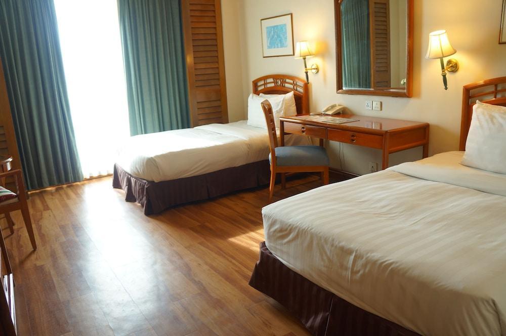 Foto de una habitación de Sabah Oriental Hotel