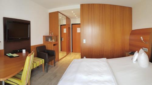 Foto de una habitación de Astralis Hotel Domizil