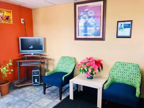 Photo – Motel QC Stay Inn