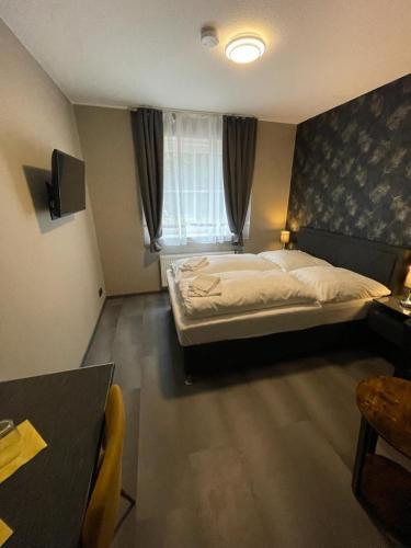 Foto de una habitación de DUA Hotel