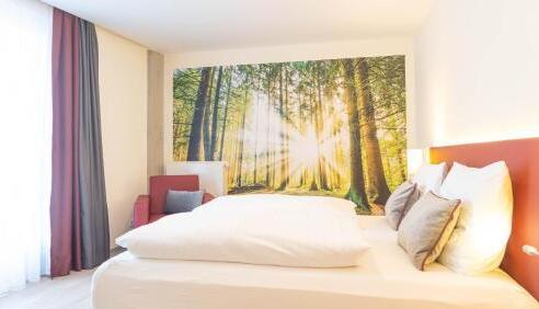 Foto de una habitación de Hotel Mythenresort Heimdall