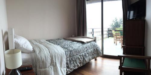 Foto de una habitación de Yemanya Hostal
