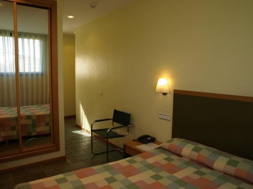 Foto de una habitación de Hotel Lugones Nor