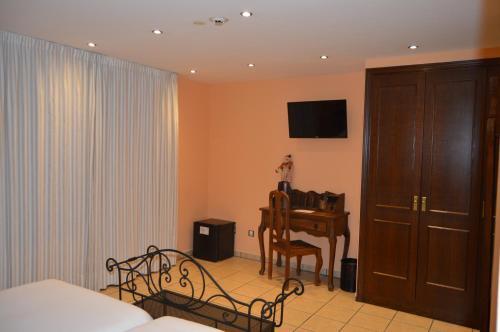 Foto de una habitación de Hotel Parador de Canolich