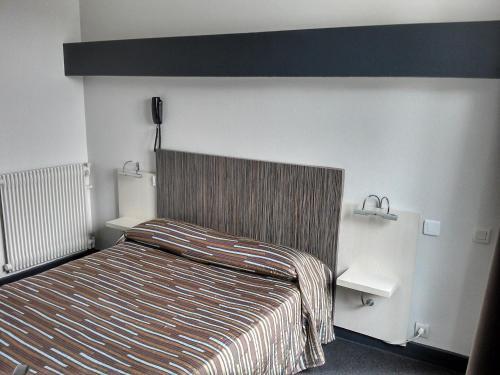 Foto de una habitación de Acqs Hôtel