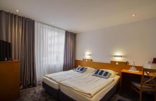 Foto de una habitación de Hotel Maxim
