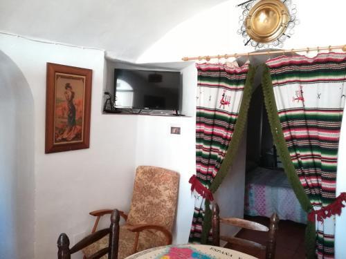 Foto de una habitación de Alquileres Vacacionales Cuevas de María