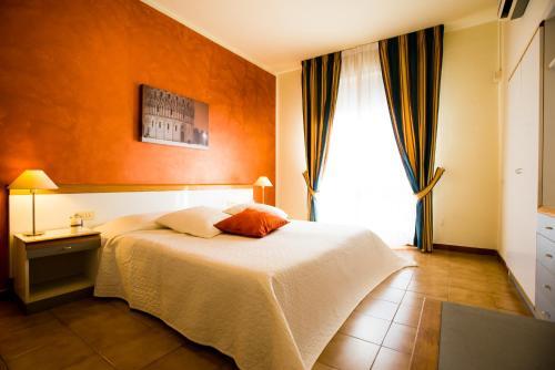 Foto de una habitación de Hotel Roma
