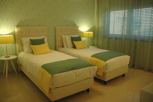 Foto de una habitación de Hotel Dom Lourenco