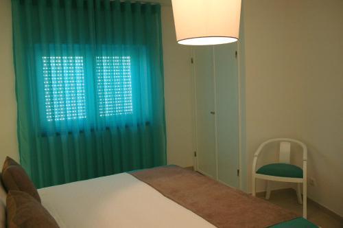Foto de una habitación de Hotel Dom Lourenco