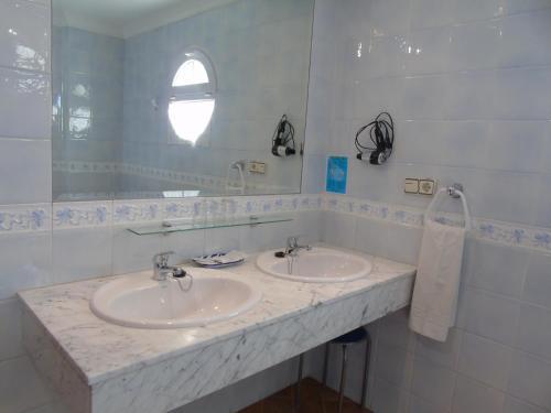 Foto de una habitación de Apartamentos Turísticos Cumbres Verdes