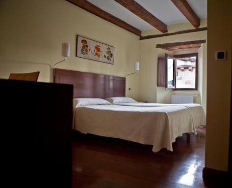Foto de una habitación de Hospederia Porta Coeli