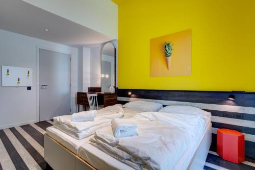Foto de una habitación de MEININGER Hotel Bruxelles Gare du Midi