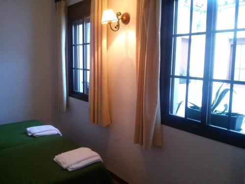Foto de una habitación de Hospederia y Aptos Casa de las Piedras