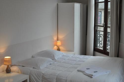 Foto de una habitación de Cafe Hotel du Theatre
