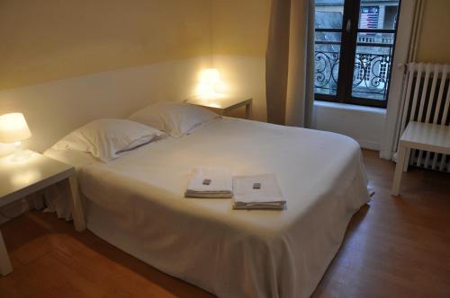 Foto de una habitación de Cafe Hotel du Theatre
